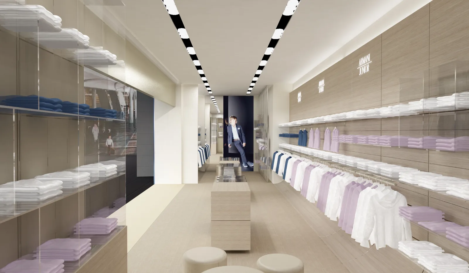 Exterior: Doha mall entrance Armani Junior store with flanking campaign lightboxes and 3D backlit logo signage