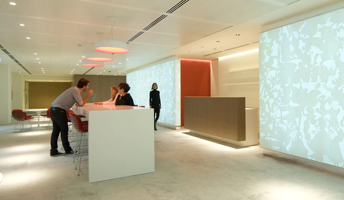 Ground floor bar area detail showing furniture arrangement with Bertoia stools and Artemide pendant lighting