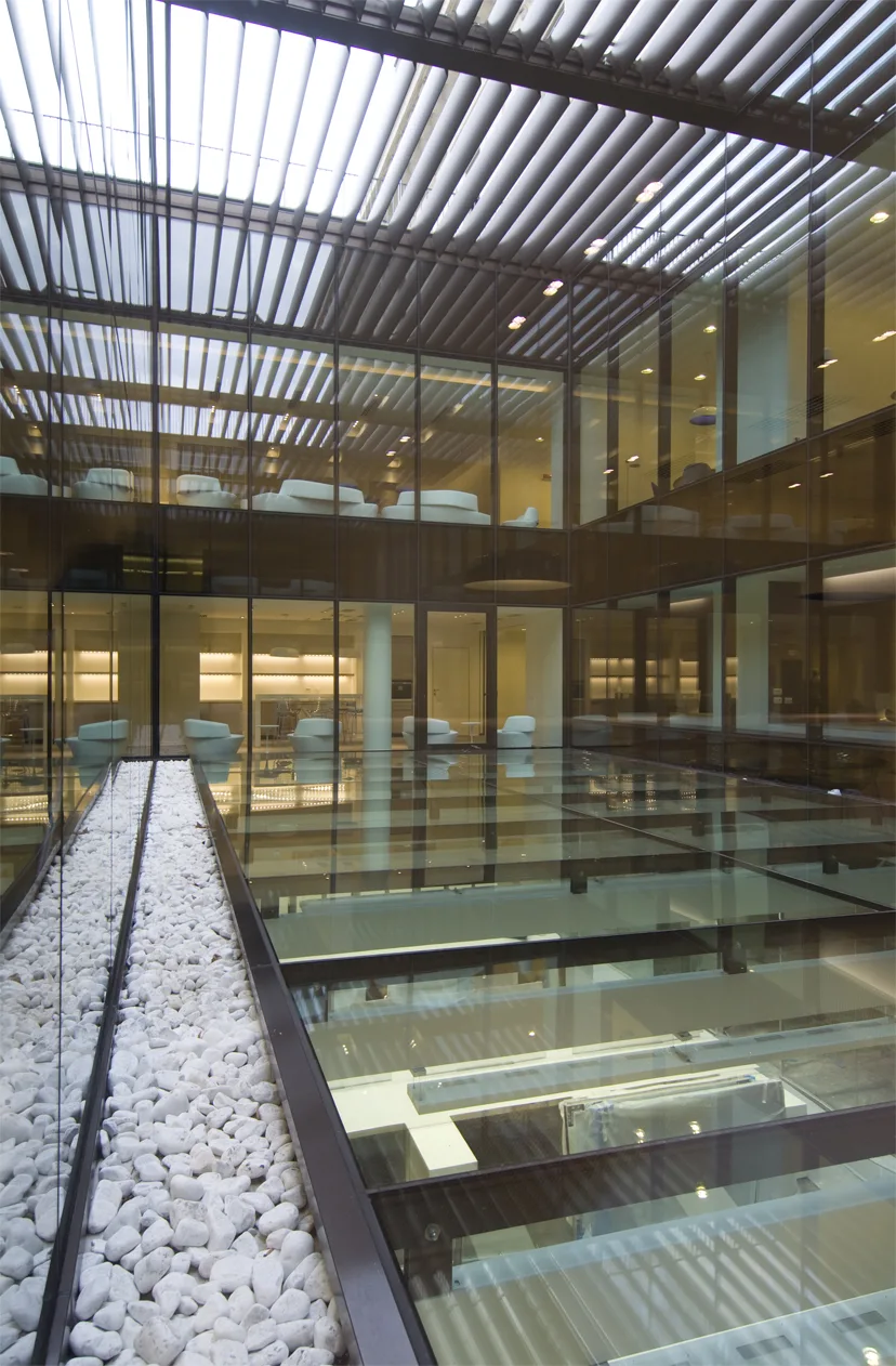 Level 1 corridor view showing the 45 Gradi environmental graphics on glass partitions