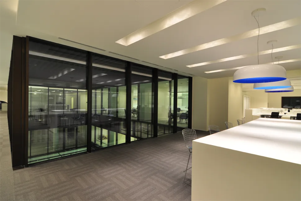 Level 2 detail of the three-dimensional textured wall panels and blue accent colour identity