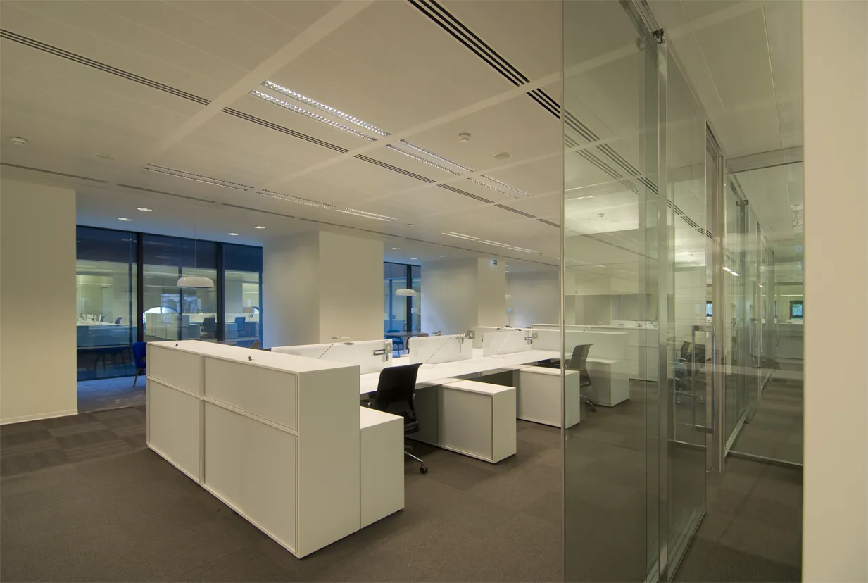 Level 2 meeting zone with the interplay of contemporary lighting and heritage brick ceiling