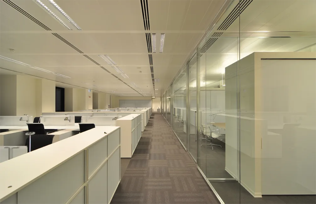 Level 4 video conference room with the consistent material language and yellow accent colour