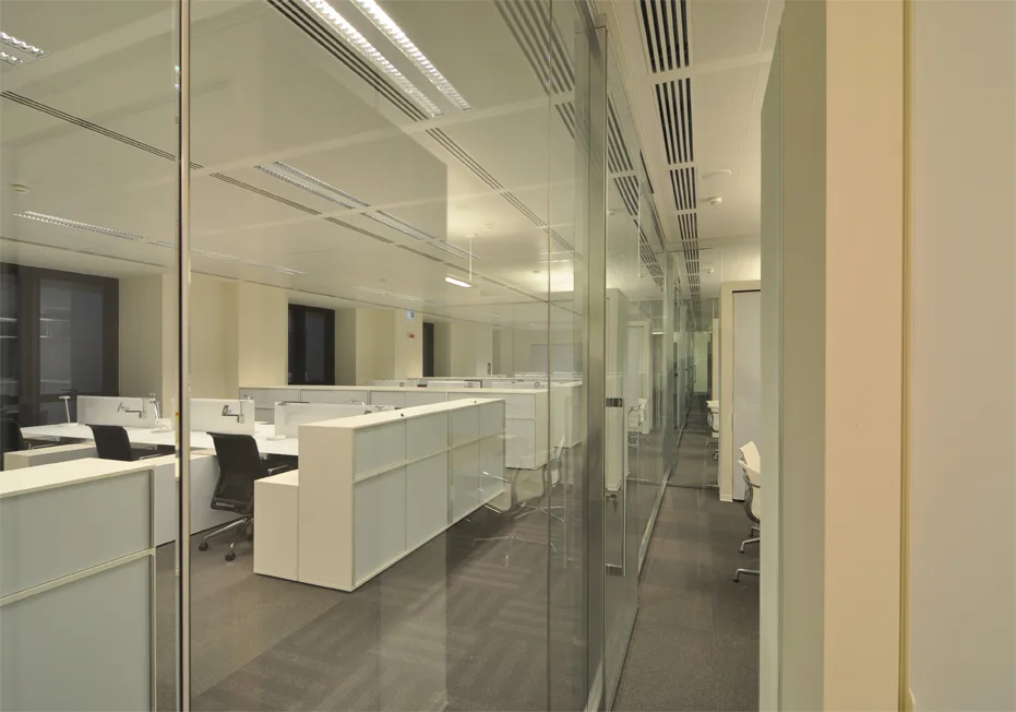 Level 4 corridor view showing the blue-grey storage walls and Disney figurine alcoves