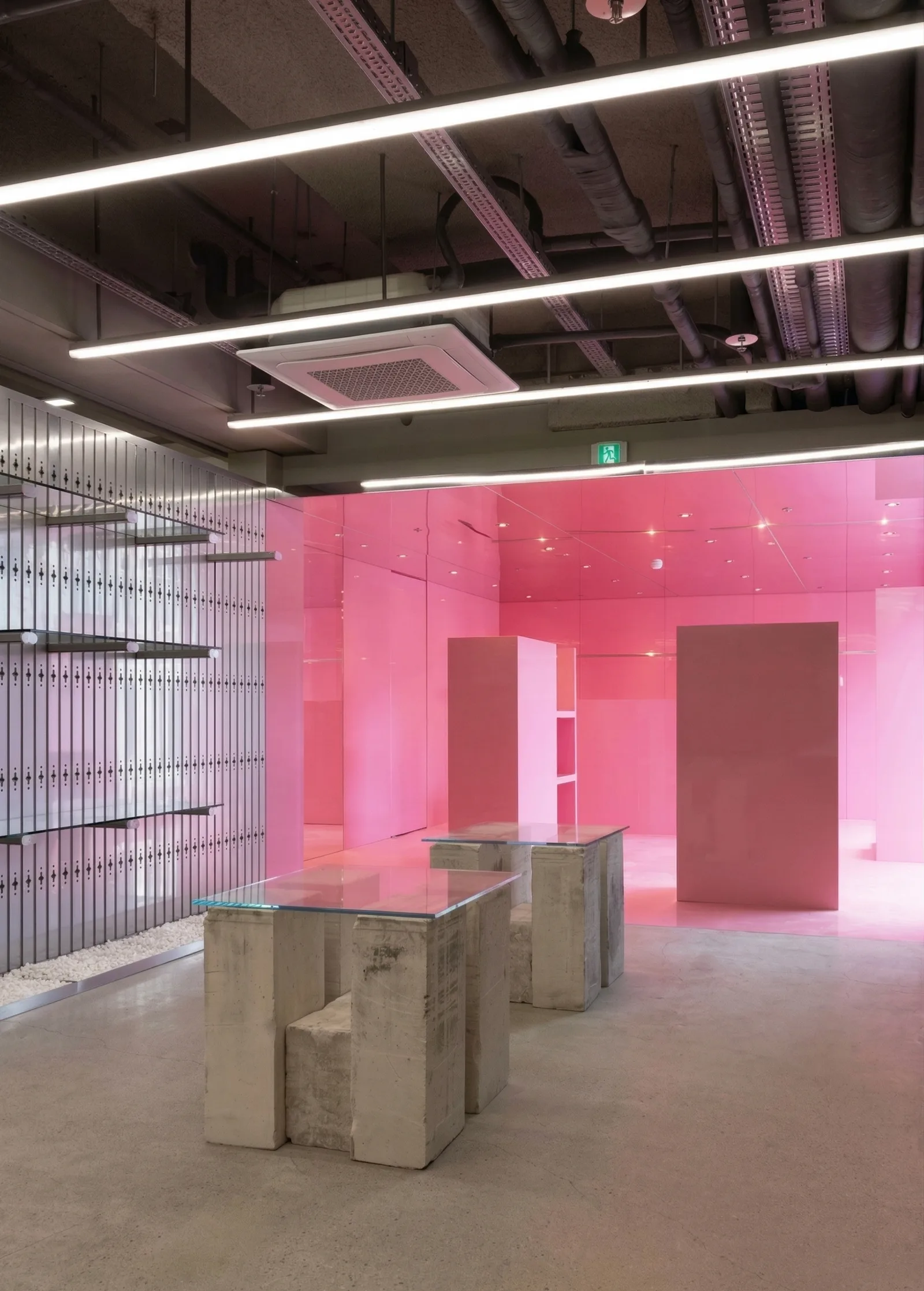 Interior: fashion boutique concept layout for Dorota Kuznica spanning three retail units totaling 326 square metres in Drukarnia mall, showing display vitrines, atelier zone, and custom fitting area
