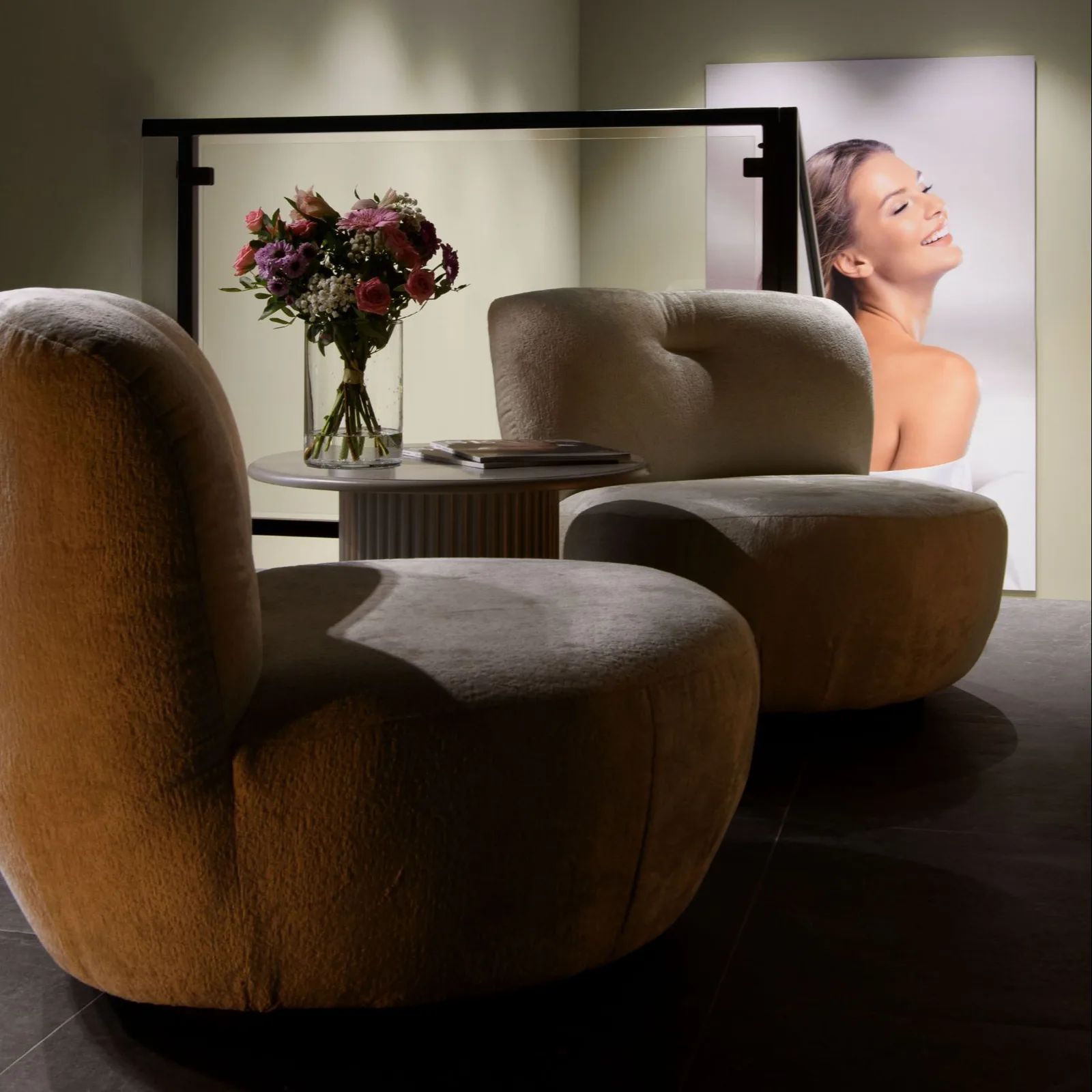 Interior: salon inspiration reference showing contemporary beauty treatment space with warm lighting, premium surfaces, and high-end hospitality atmosphere