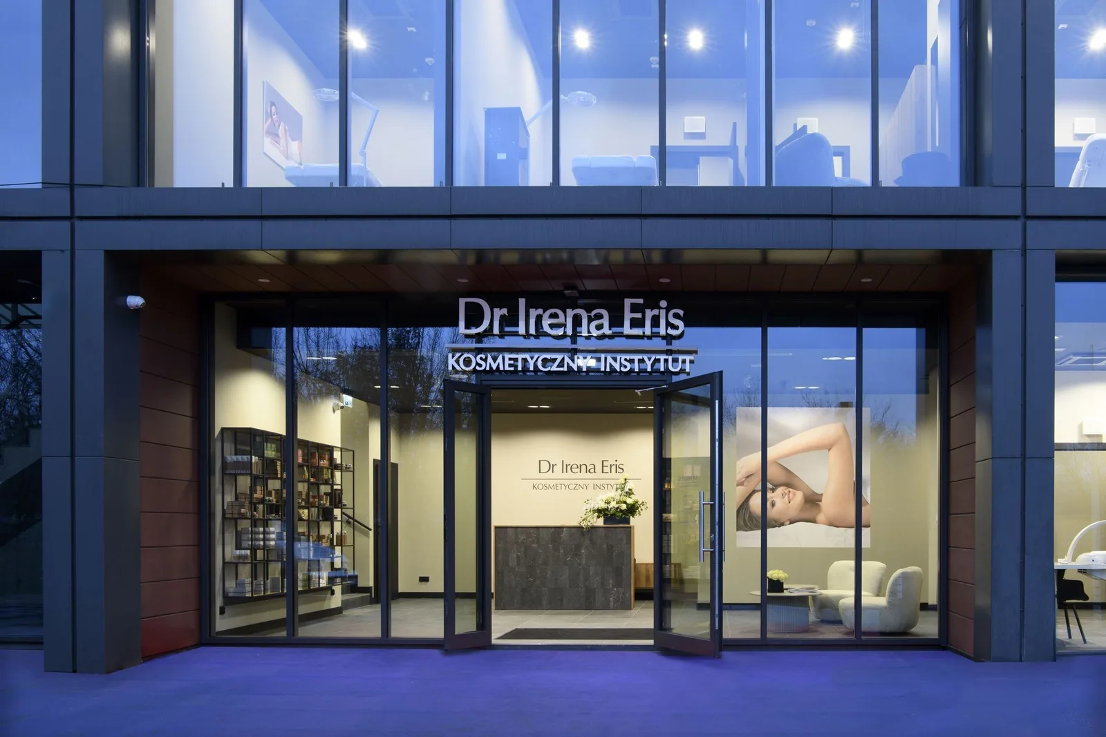 Exterior: storefront of Dr Irena Eris beauty salon at Nordic Haven tower showing branded signage, ground floor glazing, and street-level entrance