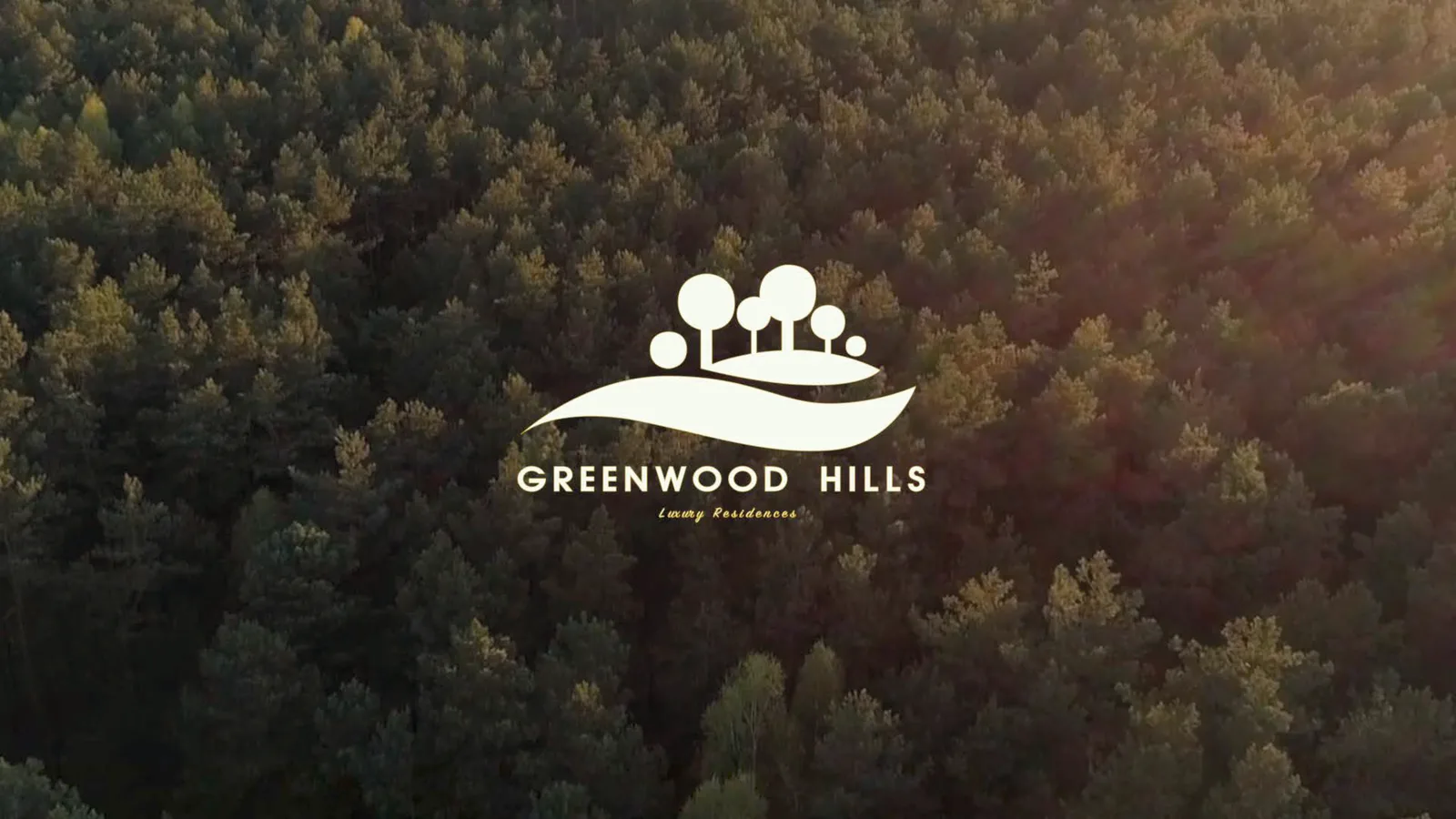 Render: brand title slide with Greenwood Hills Luxury Residences logo over aerial drone photo of dense Bory Tucholskie forest canopy at golden hour