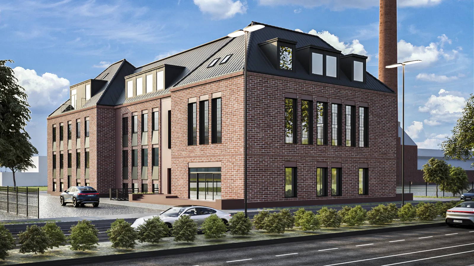 Hero: corner perspective render of the red brick adaptive reuse building showing entrance, preserved industrial chimney landmark, standing seam metal roof, dramatic vertical gable glazing, and twenty-three apartment conversion from former auditorium