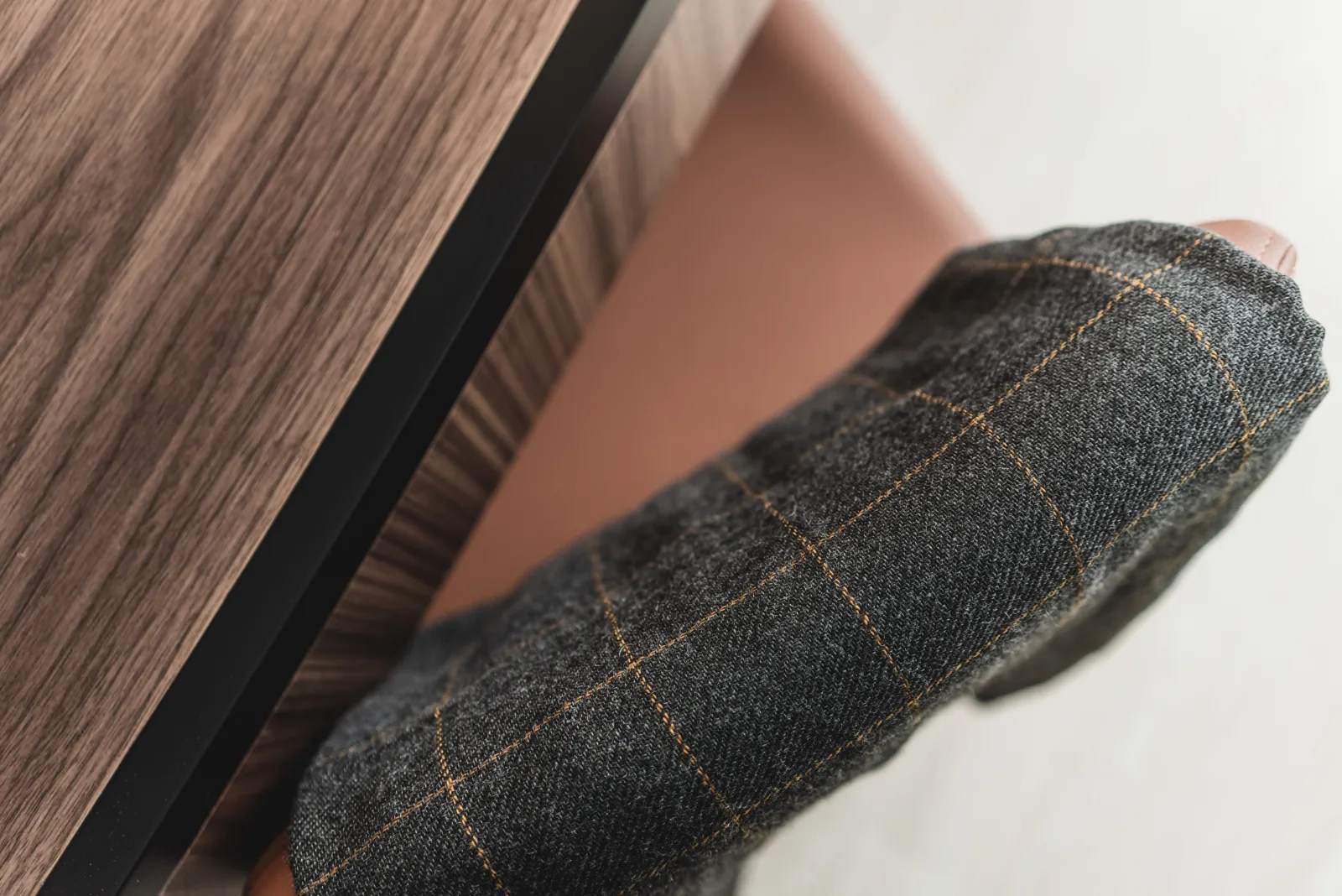 Close-up of textured cushion fabric, green tones