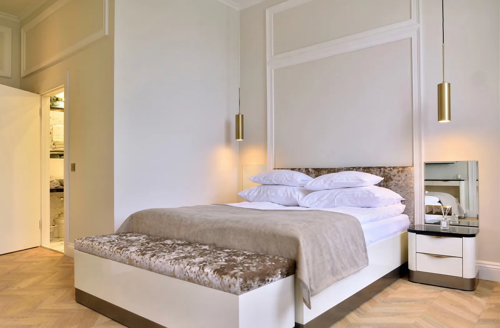 Hotel bedroom close-up with arched windows, golden curtains, white bed, and pendant light — Gemini upscale