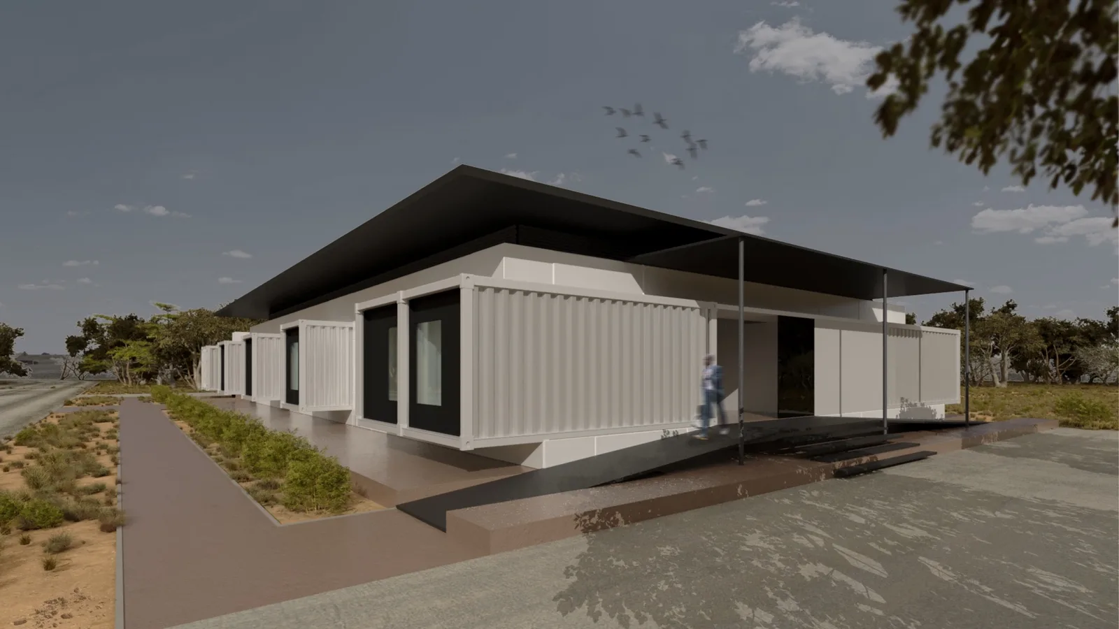 Render: compact clinic night exterior showing warm interior glow through windows, floating roof canopy silhouette, and desert setting