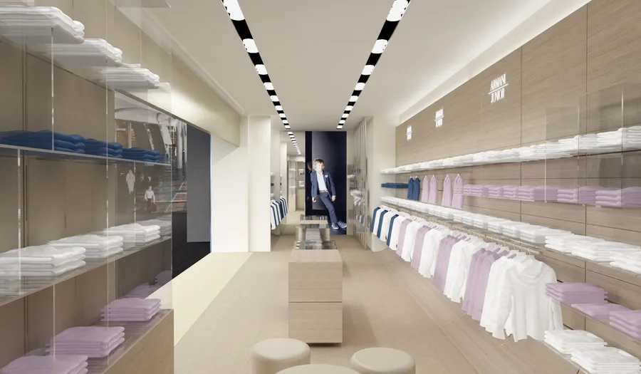 Exterior: New York Madison Avenue vetrina composite showing AJR corner-entry storefront design within Upper East Side luxury children retail corridor