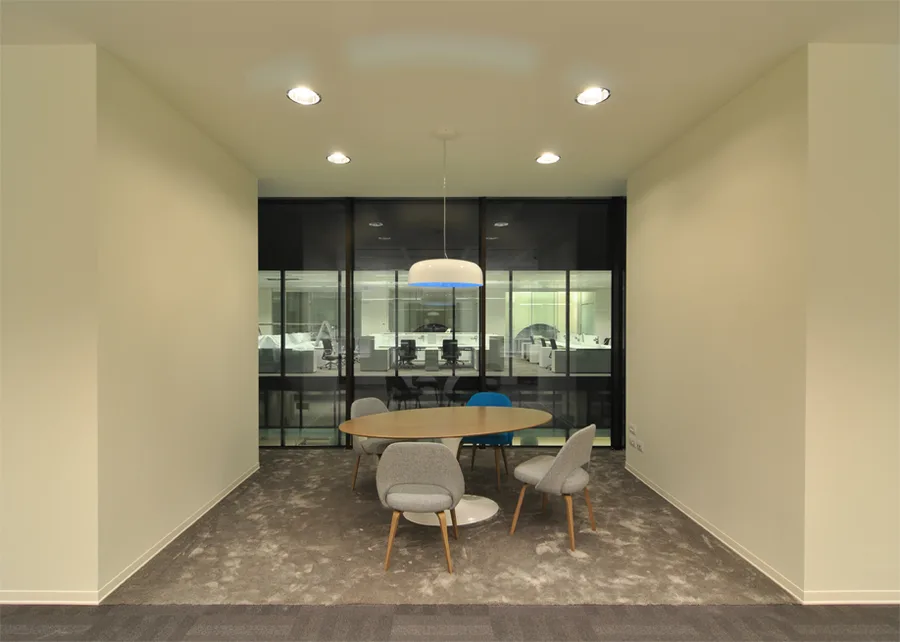 Level 2 workspace beneath the palazzo's original nineteenth-century brick vaulted arches