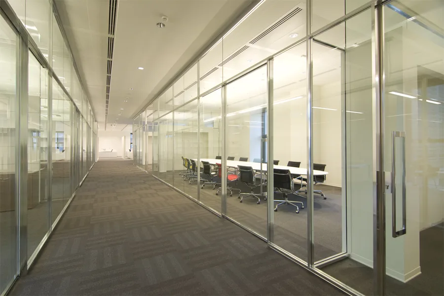 Level 3 executive lounge detail showing Tacchini Polar chairs and Grey Oak ceiling panels