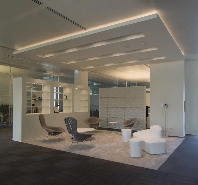 Level 3 executive meeting room with premium stone and dark wood accent finishes