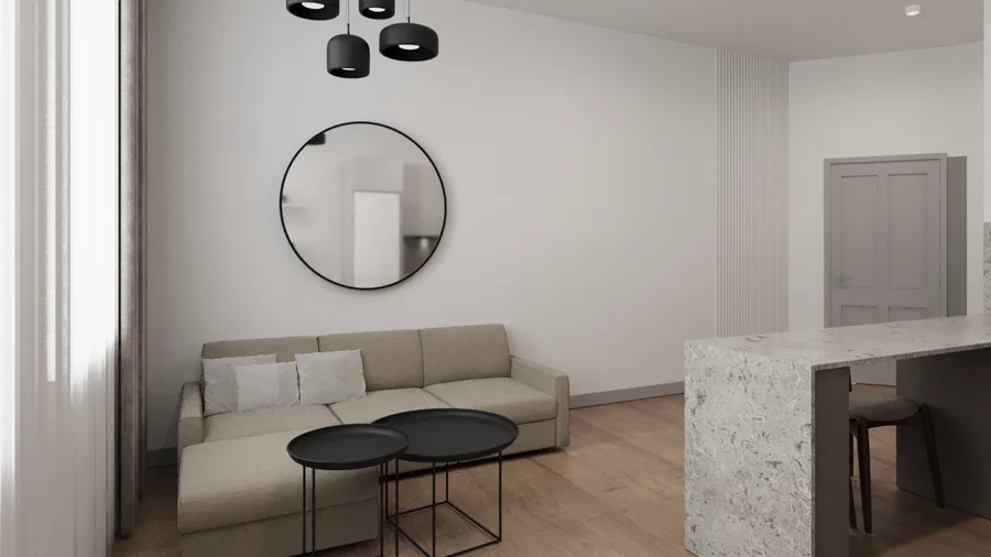 Gallery: rental unit bathroom with grey large-format gres tiles, walk-in shower with glass panel, wall-hung vanity, and round mirror