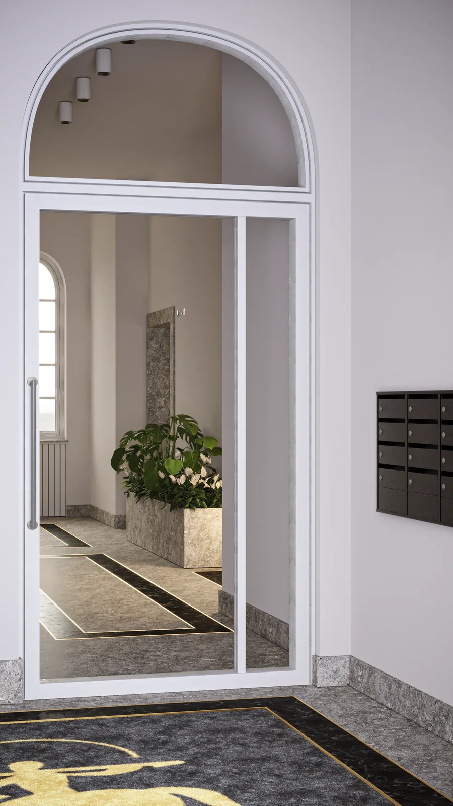 Interior: lobby area render with olive tree in layered stone planter, stone floor medallion pattern, and elevator bank with black stone surrounds and gold accents