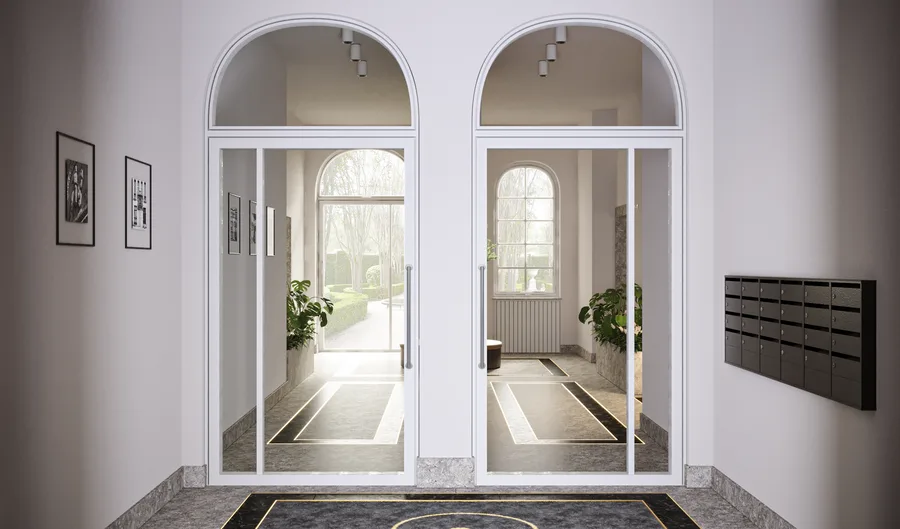Interior: concierge reception render with dark veined marble counter, backlit D67 horseman logo panel, gold accent lighting, and heritage arched doorway framing corridor