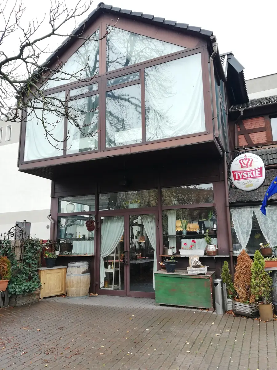 Dolce Vita restaurant facade before the Orso Nero transformation showing the original signage, awning, and pre-renovation street presence