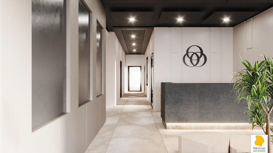 Interior: reception lobby render with dark stone reception desk, LED base lighting creating floating plinth effect, Borromean rings foundation logo on wall, Keope Brystone Grey floor tiles, and gallery corridor beyond