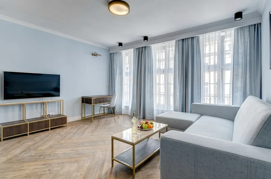 Secondary space with the Sowa colour palette, brass accents, and heritage wall finishes