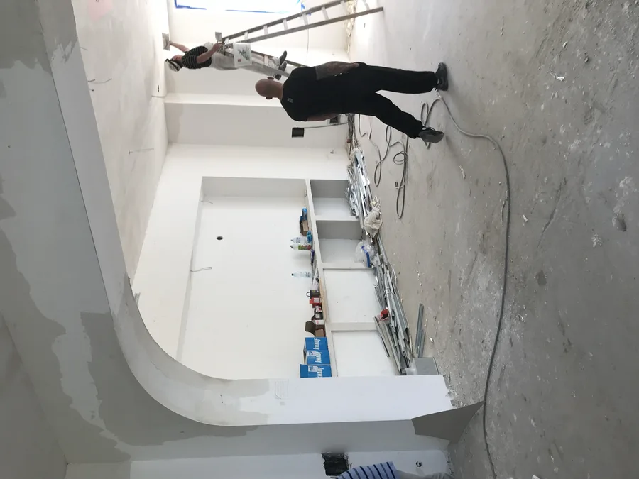 Portrait view of construction detail showing building systems