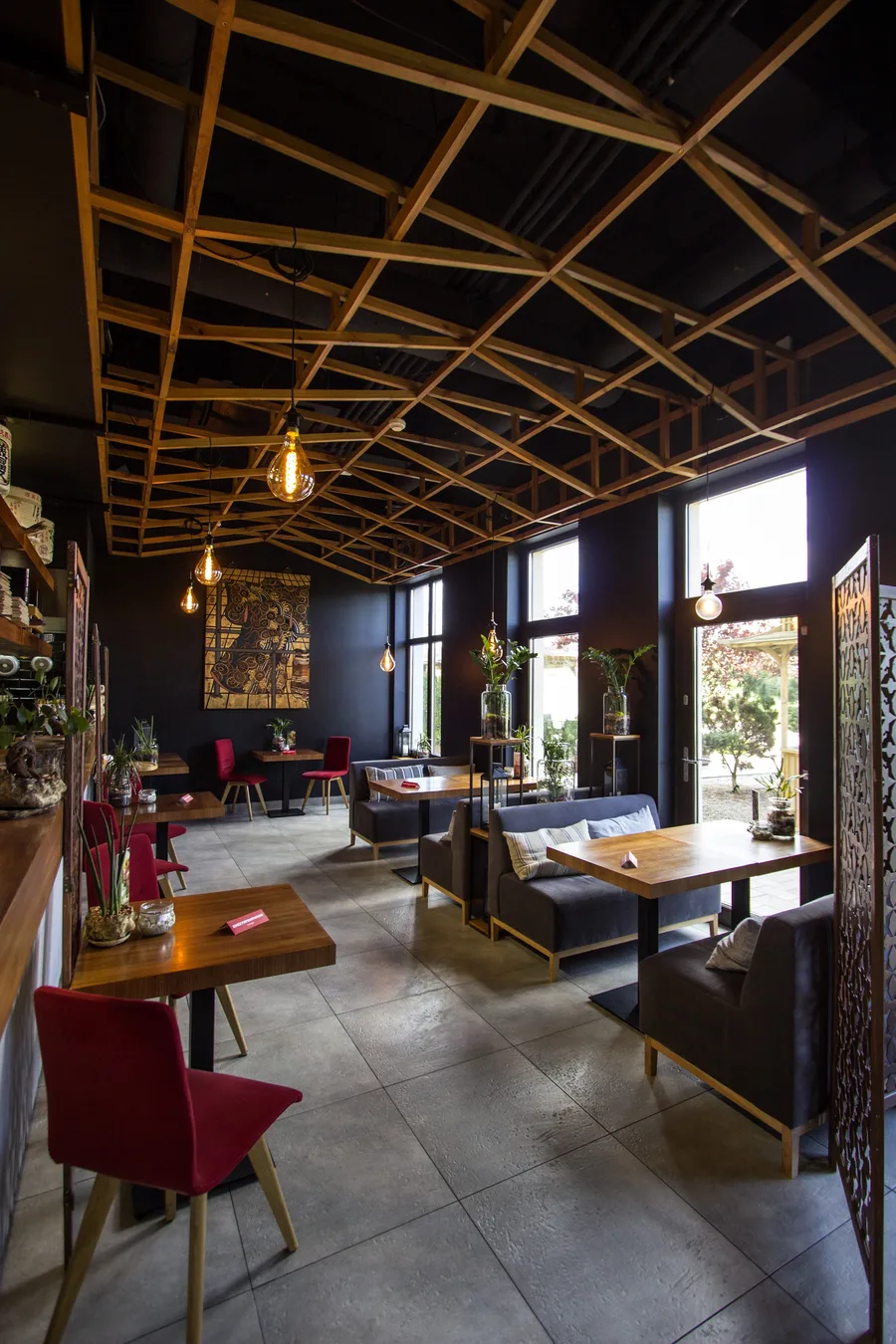 Interior: wide dining hall portrait, ceiling lattice full span, windows, mixed seating