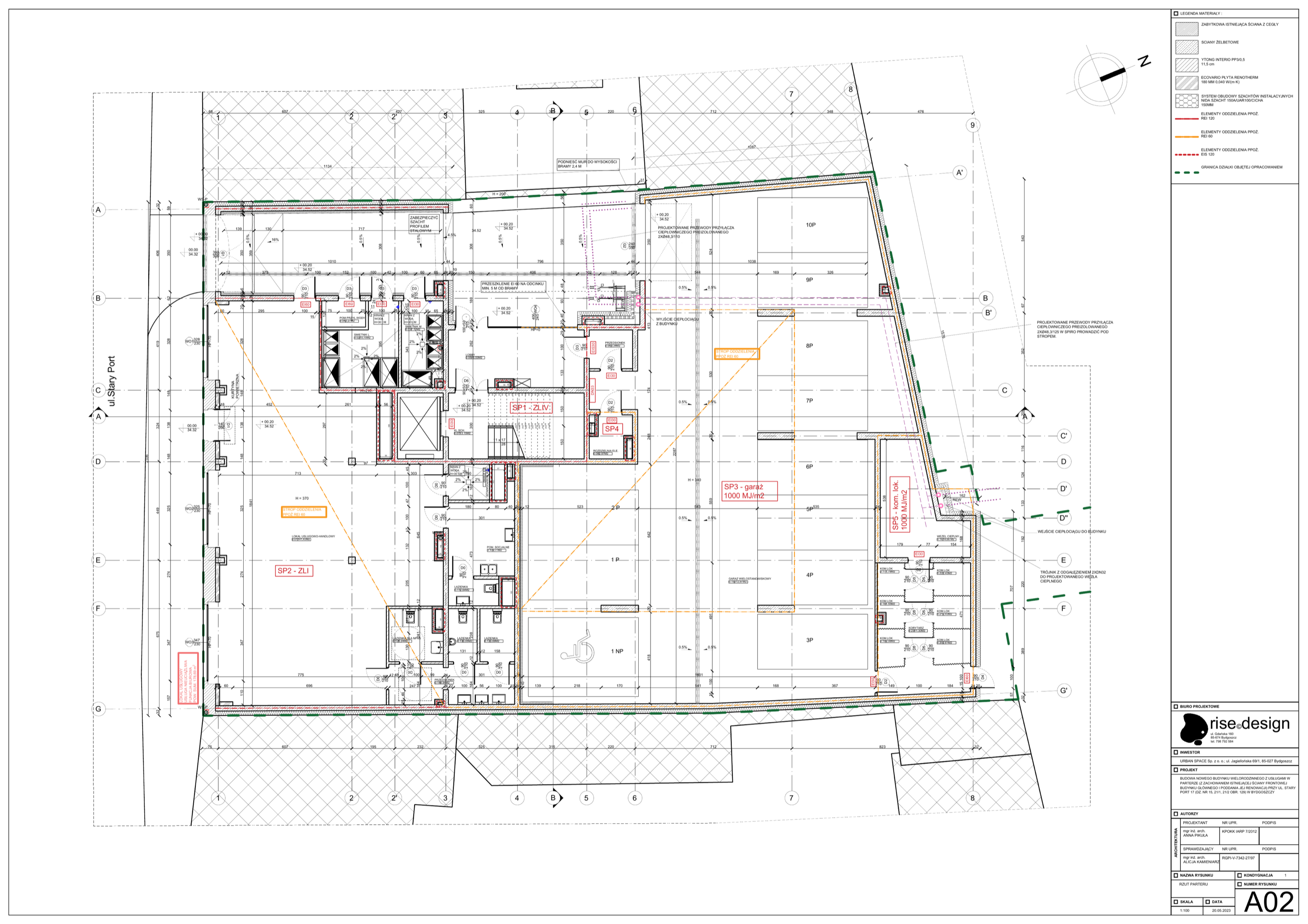 Drawing: ground floor plan showing arched gateway passage, commercial unit with heritage storefront windows, residential lobby, and underground garage access ramp